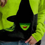 Sophia green witch sweatshirt in green, black, detail view