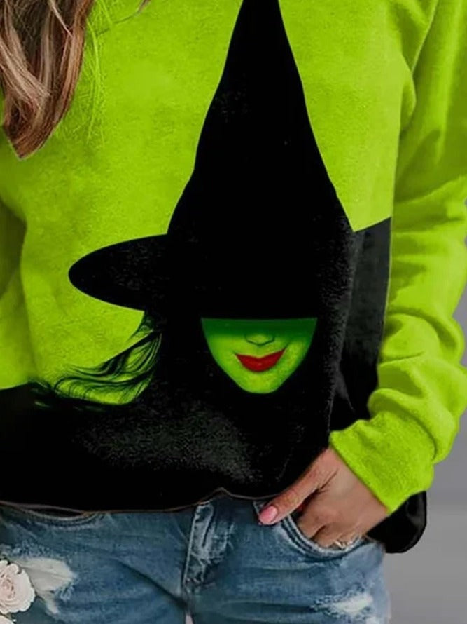 Sophia green witch sweatshirt in green, black, detail view