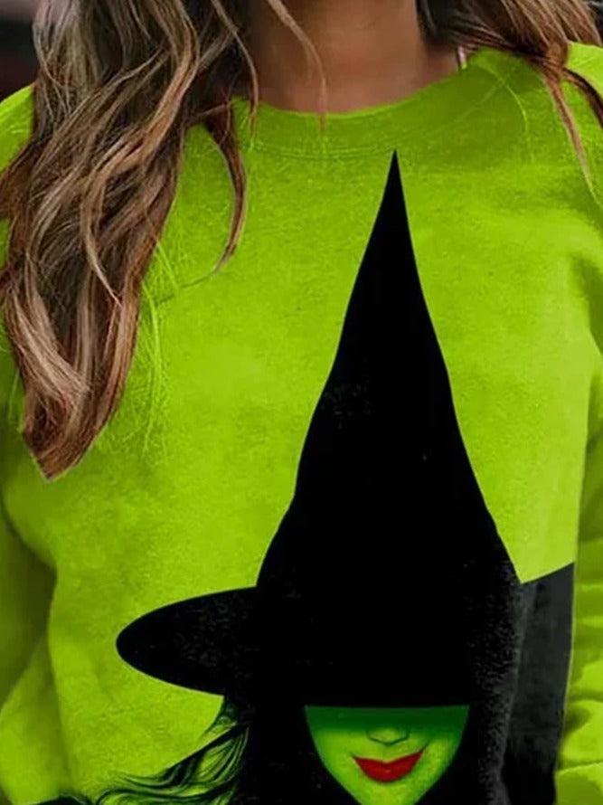 Sophia green witch sweatshirt in green, black, detail view