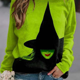 Sophia green witch sweatshirt in green, black, front view