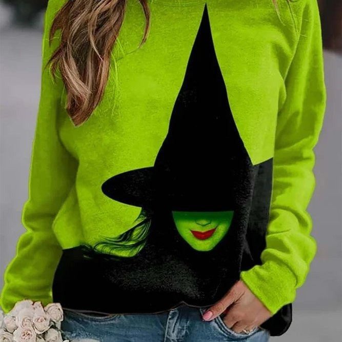 Sophia green witch sweatshirt in green, black, front view