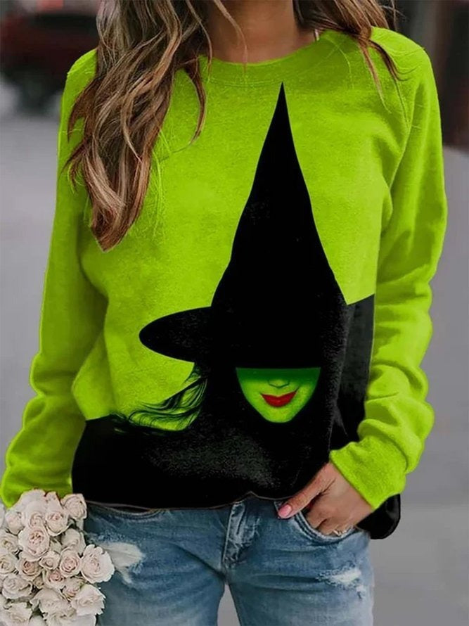 Sophia green witch sweatshirt in green, black, front view
